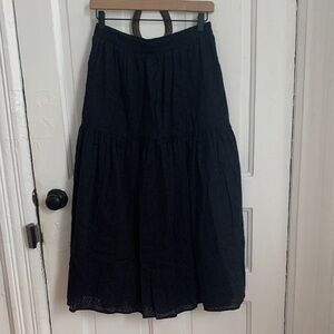 Black eyelet tiered midi skirt